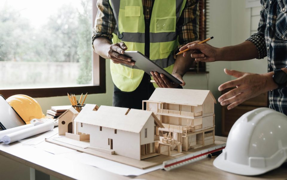 Two person discussing design